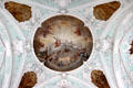 Overview of Baroque ceiling with holy trinity surrounded by saints in heaven at Gößweinstein pilgrimage basilica. Gößweinstein, Germany