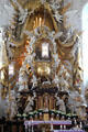 Baroque main altar with images of coronation of Mary by Johann Jakob Michael Küchel at Gößweinstein pilgrimage basilica. Gößweinstein, Germany.