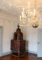 Tile room stove under rococo ceiling & chandelier at Fembohaus City Museum. Nuremberg, Germany.