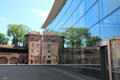 Neues Museum Nürnberg reflects section of city wall at Frauentor. Nuremberg, Germany.