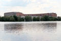 View of unfinished Nazi Congress Hall above lake at Party Rally Grounds, now Documentation Centre. Nuremberg, Germany.