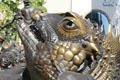 Detail of lizard face on Marriage Carousel sculpture fountain located near White Tower. Nuremberg, Germany