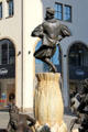 Figure, probably Hans Sachs, dances above Marriage Carousel sculpture. Nuremberg, Germany.