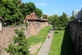 Walking path along moat beside western city wall. Nuremberg, Germany.
