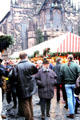 Visitors at Christmas Market on City Hall & Frauen Kirche square. Nuremberg, Germany.