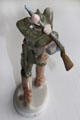 Porcelain figure of WWI German infantry soldier using rifle as club sculpted by Karl Himmelstoss for Rosenthal in private collection. Germany.