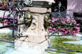 Grotesque faces forming part of fountain in Bavaria. Germany.