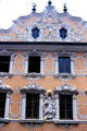 Center gable of Haus zum Falken with highly ornate Baroque style façade , building destroyed in WWII bombing, re-built from old photos. Würzburg, Germany.