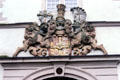 Coat of arms of the Teutonic Order over the doorway of Evangelical Castle Church. Bad Mergentheim, Germany.