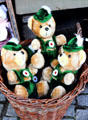 Plush bears in a basket in Bavarian costume in shop window. Dinkelsbühl, Germany