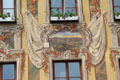 Detail with antique city view on neo-baroque mural on wall of Steuerhaus. Memmingen, Germany.