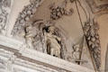 Baroque plasterwork depicting St Peter, cherubs & garlands in St Benedict church at Benediktbeuern Abbey. Germany.
