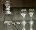 Set of glasses & carafe with crown emblem manufactured by Theresienthal & silver "lark skewers" made by Louis Rappolt at King Ludwig II Museum. Chiemsee, Germany.