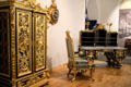 Ornate gilded cabinet & desk at King Ludwig II Museum. Chiemsee, Germany.