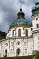 Large dome & clock tower of Ettal Benedictine Abbey on German Alpine road near Oberammergau. Ettal village, Germany.