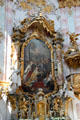 Baroque altar with painting of St Corbinian at Ettal Benedictine Abbey. Ettal village, Germany.