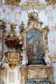 Baroque altar with painting of Christ with Holy Apostles at Ettal Benedictine Abbey. Ettal village, Germany.
