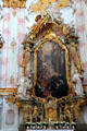 Baroque altar with painting of St. Benedict at Ettal Benedictine Abbey. Ettal village, Germany.