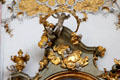 Gilded baroque carving of cherubs in clouds at Ettal Benedictine Abbey. Ettal village, Germany.