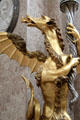 Detail of winged dragon candle holder at Basilica St Mang. Füssen, Germany