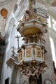 Baroque pulpit adorned with cherubs at Basilica St Mang. Füssen, Germany.