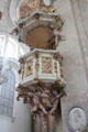 Baroque pulpit adorned with cherubs at Basilica St Mang. Füssen, Germany.