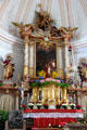 High altar of St Aegidius parish church crowned with Archangel Michael slaying Satan with spear. Gmund am Tegernsee, Germany