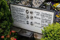 Family tombstone with photos of each member in cemetery of St Aegidius parish church. Gmund am Tegernsee, Germany.