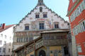 Old Town Hall with stepped roof, decorative murals on facade & wooden gallery. Lindau im Bodensee, Germany.