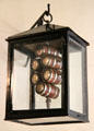Square lamp with stack of mini-beer-barrels insert at Lindau Municipal Museum. Lindau im Bodensee, Germany
