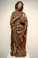 St John the Evangelist carving carrying his lamb symbol by unknown artist at Ulmer Museum. Ulm, Germany.