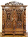 Carved cabinet with allegorical female figures of abundance at Ulmer Museum. Ulm, Germany.