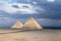 Pyramids of Cheops & Chephren in brilliant sun before storm. Giza, Egypt