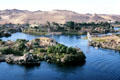 Dunes & rocky islands on Nile River at Aswan. Egypt.