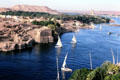 Nile River with traditional Egyptian Felucca sailboats at Aswan. Egypt.