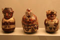 Three Nazca culture ceramic bottles showing carriers of goods from Peru at Museum of America. Madrid, Spain.