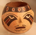 Nazca culture ceramic global vessel face with eye in the shape of a bird's head from Peru at Museum of America. Madrid, Spain