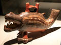 Nazca culture ceramic vessel in shape of toothed marine monster from Peru at Museum of America. Madrid, Spain.