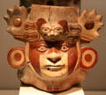 Moche ceramic vessel head with face painting & jaguar headdress from Peru at Museum of America. Madrid, Spain