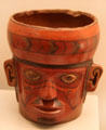 Wari culture ceramic portrait head with facial tattoos from Peru at Museum of America. Madrid, Spain.