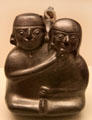 Chimu culture ceramic stirrup-spout bottle with loving couple from Peru at Museum of America. Madrid, Spain.