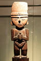 Chimu culture wood carving male figure for offering from Peru at Museum of America. Madrid, Spain.