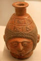 Inca ceramic bottle with human face from Peru at Museum of America. Madrid, Spain.