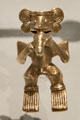 Tairona culture anthropoidal gold pendant from Colombia at Museum of America. Madrid, Spain