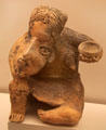 Nayarit culture ceramic sitting female figure with humpback from Western Mexico at Museum of America. Madrid, Spain
