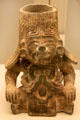 Zapoteca culture ceramic sitting male vessel with feline traits from Monte Alban Mexico at Museum of America. Madrid, Spain.