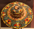 Amazonian native sombrero decorated with parrot feathers at Museum of America. Madrid, Spain.