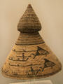 Nutka culture woven hat with whale hunting scene from Northwest Coast America at Museum of America. Madrid, Spain.