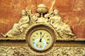 Clock with symbols of progress in Queen Regent's room at Barcelona City Hall. Barcelona, Spain.