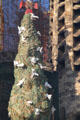 Carved doves on carved tree on Nativity Facade at Sagrada Familia. Barcelona, Spain.